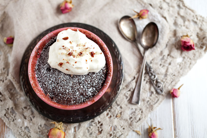 54188950 - homemade chocolate mug cake with icing sugar